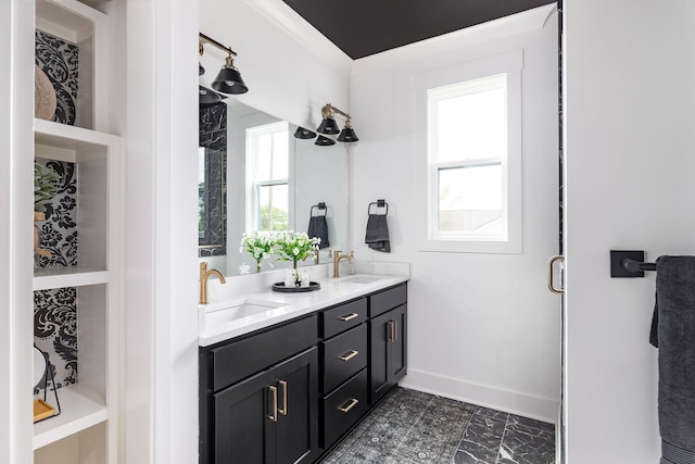 326A E Trinity Ln, Nashville, TN 37207 - bathroom with double vanity, baseboards, and marble look tiles