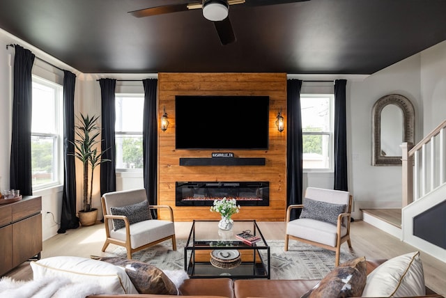 326A E Trinity Ln, Nashville, TN 37207 - living area with wood finished floors, a glass covered fireplace, ceiling fan, and baseboards