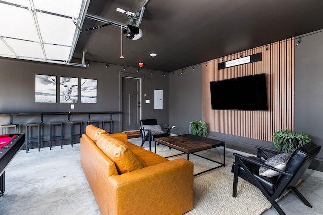 326A E Trinity Ln, Nashville, TN 37207 - living area with concrete flooring, a garage, electric panel, and recessed lighting