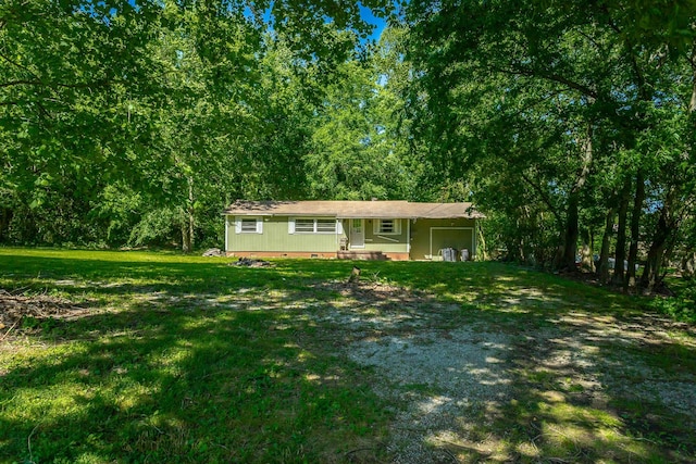 117 Westbrook Ave, Soddy Daisy, TN 37379 - view of front facade with a front lawn, crawl space, and a forest view