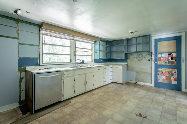 117 Westbrook Ave, Soddy Daisy, TN 37379 - kitchen with stainless steel dishwasher, a sink, open shelves, light countertops, and white cabinets