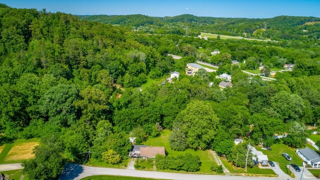 117 Westbrook Ave, Soddy Daisy, TN 37379 - aerial view of property and surrounding area featuring a heavily wooded area