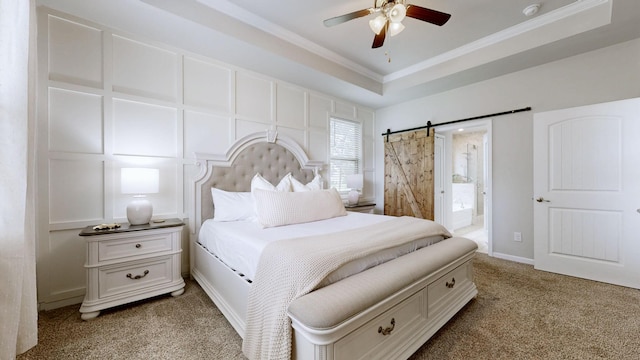 6614 Floral Ct, Murfreesboro, TN 37128 - bedroom featuring light colored carpet, ornamental molding, a barn door, ensuite bathroom, and a raised ceiling