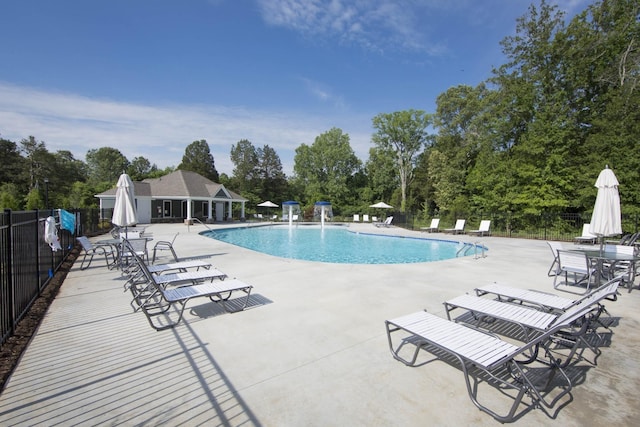 6614 Floral Ct, Murfreesboro, TN 37128 - community pool featuring view of scattered trees and a patio area