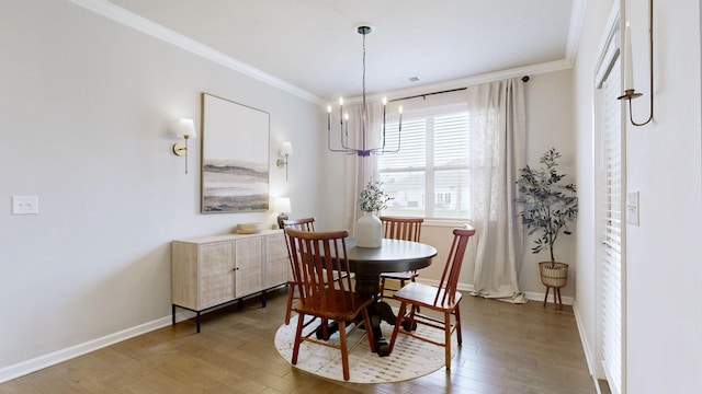 6614 Floral Ct, Murfreesboro, TN 37128 - dining space featuring crown molding, a chandelier, wood-type flooring, and baseboards