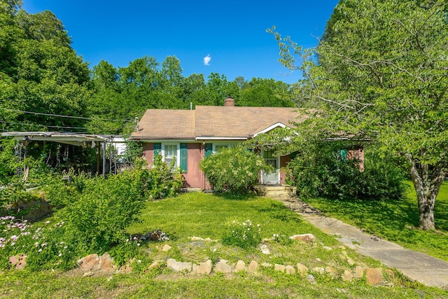 119 Westbrook Ave, Soddy Daisy, TN 37379 - view of front of house featuring a front lawn and a chimney
