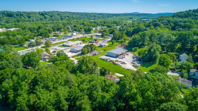 119 Westbrook Ave, Soddy Daisy, TN 37379 - aerial view of property and surrounding area with a heavily wooded area