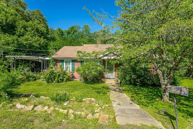 119 Westbrook Ave, Soddy Daisy, TN 37379 - view of property hidden behind natural elements with a front yard and a chimney