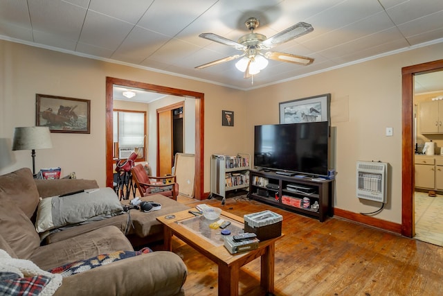 119 Westbrook Ave, Soddy Daisy, TN 37379 - living area featuring heating unit, wood-type flooring, a ceiling fan, ornamental molding, and baseboards