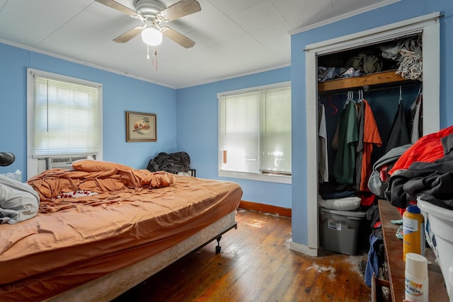 119 Westbrook Ave, Soddy Daisy, TN 37379 - bedroom featuring crown molding, wood-type flooring, baseboards, a closet, and a ceiling fan
