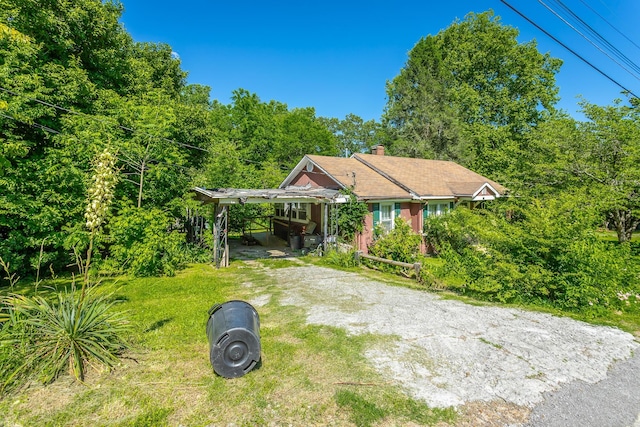 119 Westbrook Ave, Soddy Daisy, TN 37379 - view of front of property featuring a chimney and a front yard
