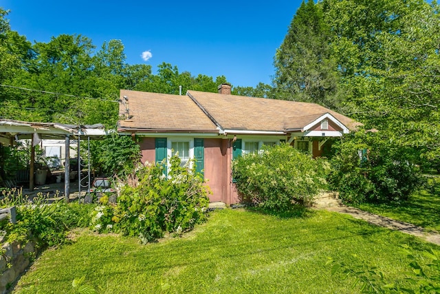 119 Westbrook Ave, Soddy Daisy, TN 37379 - view of front of home featuring a front lawn and a chimney