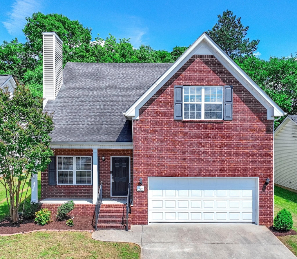 730 Pantera Dr, Murfreesboro, TN 37128 - view of front facade featuring brick siding, a shingled roof, and an attached garage