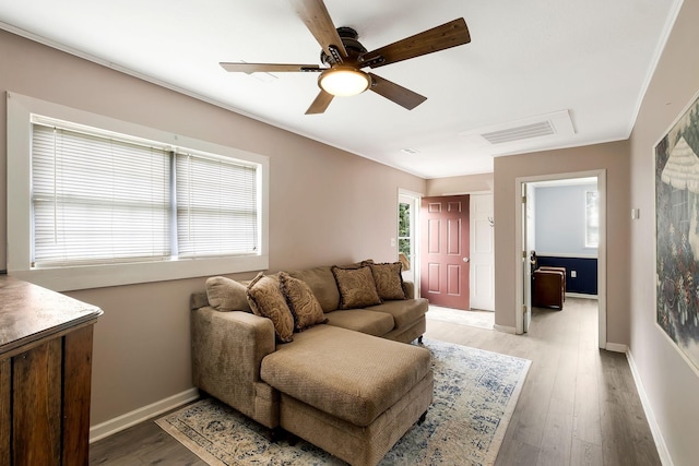 7464 Harrington Pl, Lyles, TN 37098 - living area with light wood-style flooring, ceiling fan, and baseboards