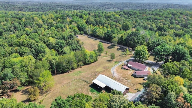 7464 Harrington Pl, Lyles, TN 37098 - aerial overview of property's location with a heavily wooded area