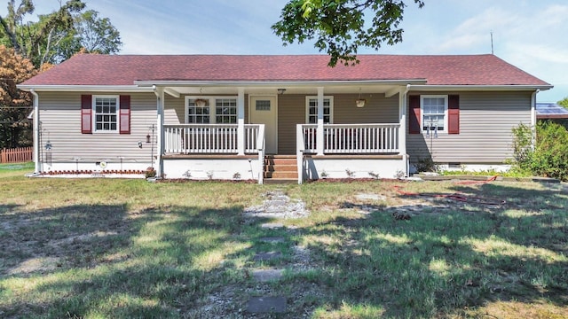 7464 Harrington Pl, Lyles, TN 37098 - ranch-style home featuring a porch, a front lawn, crawl space, and a shingled roof