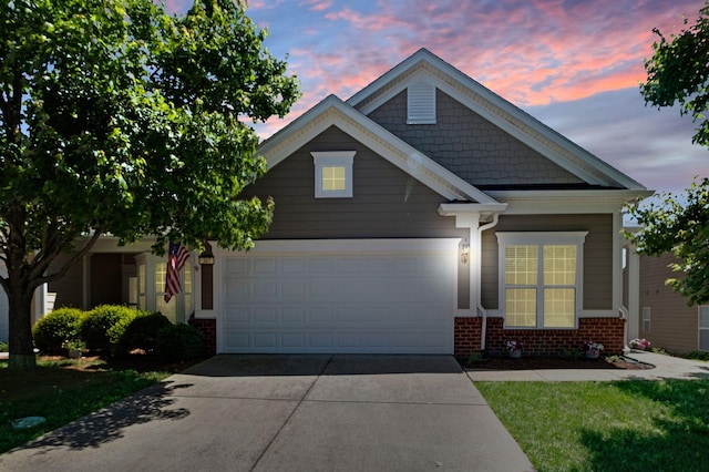 347 Blockade Ln, Mount Juliet, TN 37122 - view of front of property featuring an attached garage, concrete driveway, and brick siding