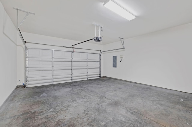 347 Blockade Ln, Mount Juliet, TN 37122 - garage featuring a garage door opener and electric panel