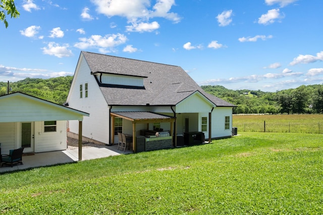 8035 Auburntown Rd, Auburntown, TN 37016 - rear view of house featuring a patio and roof with shingles