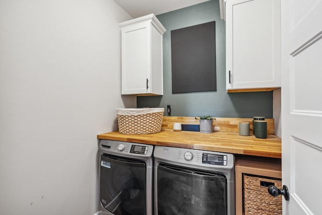 8035 Auburntown Rd, Auburntown, TN 37016 - laundry room featuring washing machine and clothes dryer and cabinet space