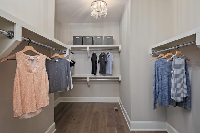 7243 Murrel Dr, Franklin, TN 37064 - spacious closet featuring wood finished floors and a chandelier