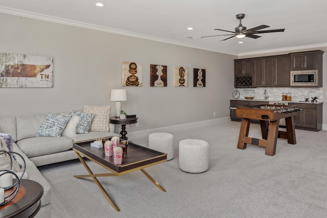 7243 Murrel Dr, Franklin, TN 37064 - living area with crown molding, a ceiling fan, recessed lighting, light colored carpet, and baseboards