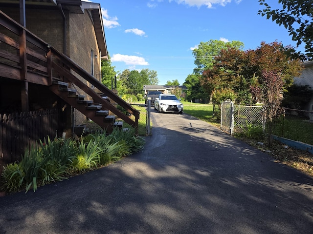 4548 Andrew Jackson Pkwy, Hermitage, TN 37076 - view of asphalt driveway with a gated entry and stairs