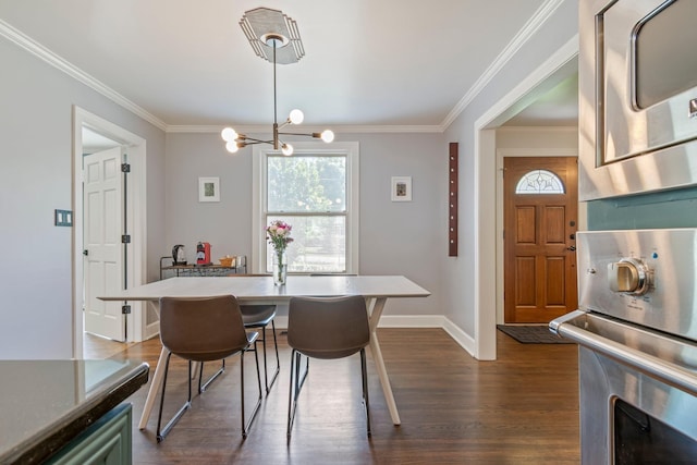 1135 Riverwood Dr, Nashville, TN 37216 - dining room with dark wood-type flooring, ornamental molding, a chandelier, and baseboards