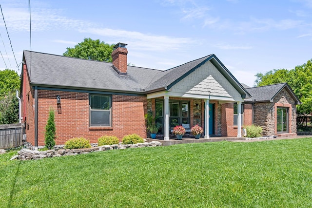 1135 Riverwood Dr, Nashville, TN 37216 - view of front of property with a chimney, a porch, roof with shingles, and brick siding