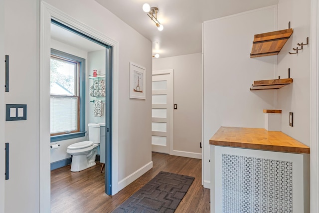 1135 Riverwood Dr, Nashville, TN 37216 - hallway with dark wood-type flooring and baseboards