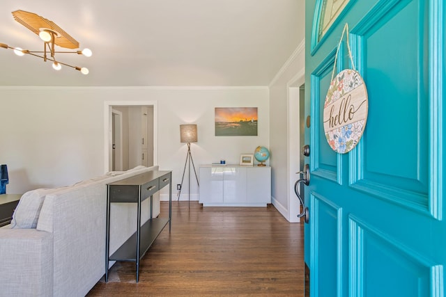 1135 Riverwood Dr, Nashville, TN 37216 - foyer entrance featuring ornamental molding, dark wood finished floors, a chandelier, and baseboards