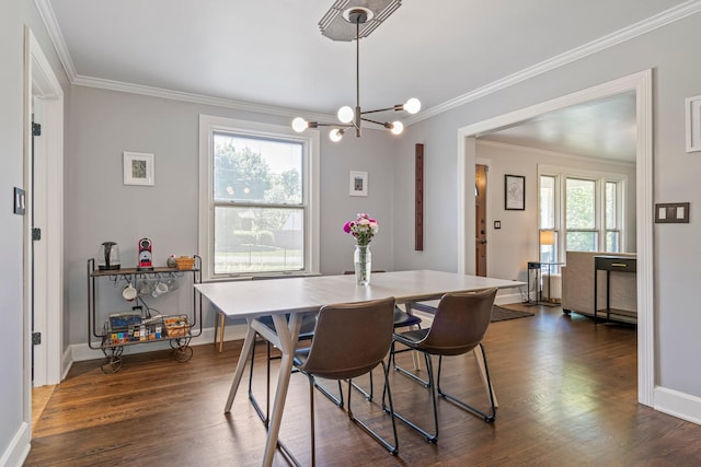 1135 Riverwood Dr, Nashville, TN 37216 - dining room featuring crown molding, dark wood-style floors, a chandelier, and baseboards