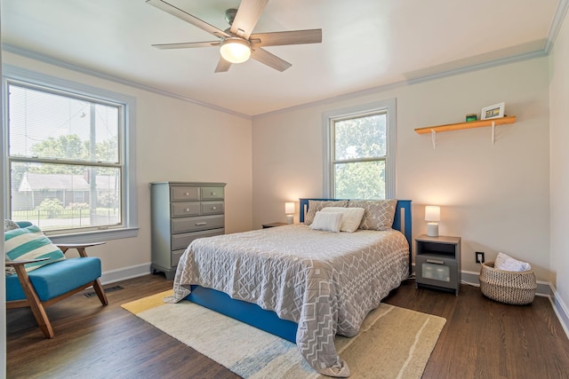 1135 Riverwood Dr, Nashville, TN 37216 - bedroom featuring crown molding, multiple windows, dark wood-style flooring, and baseboards