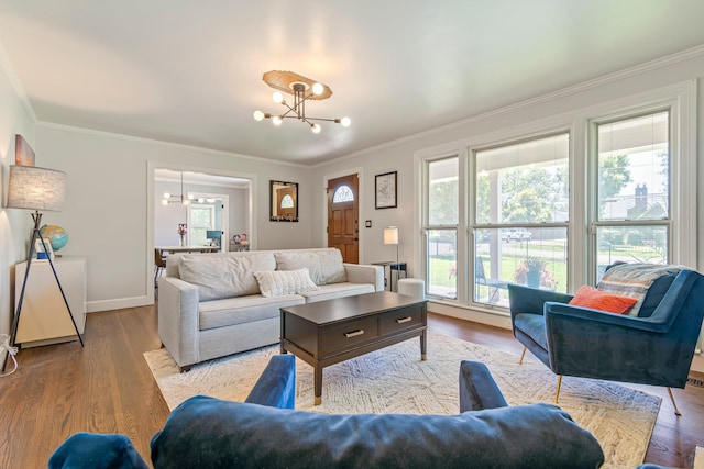 1135 Riverwood Dr, Nashville, TN 37216 - living room with a chandelier, ornamental molding, wood finished floors, and baseboards