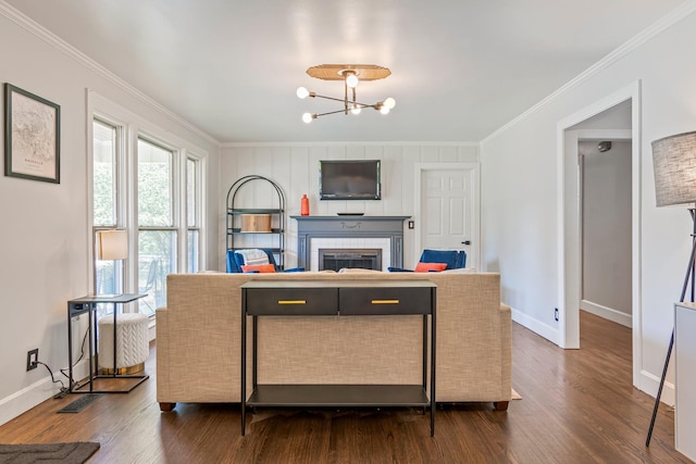 1135 Riverwood Dr, Nashville, TN 37216 - living room with crown molding, dark wood-style flooring, baseboards, a fireplace, and a chandelier