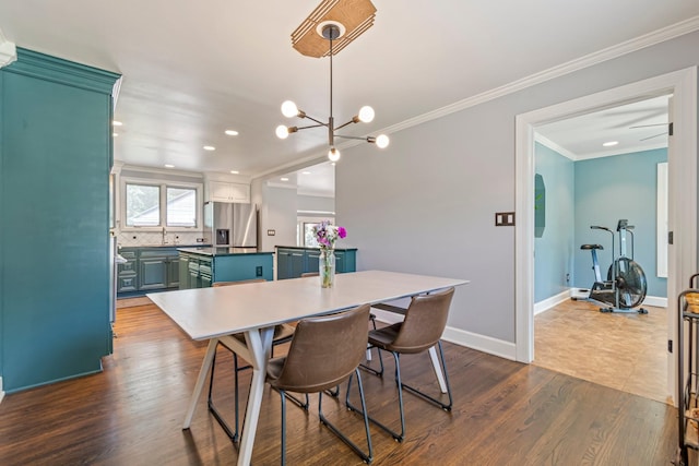 1135 Riverwood Dr, Nashville, TN 37216 - dining area featuring ornamental molding, dark wood finished floors, baseboards, a chandelier, and recessed lighting