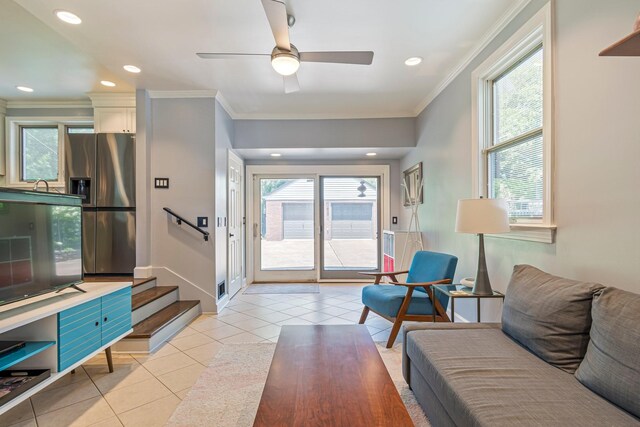 1135 Riverwood Dr, Nashville, TN 37216 - living area featuring light tile patterned flooring, healthy amount of natural light, ornamental molding, stairway, and a ceiling fan