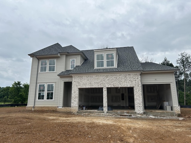 7317 Winners Rd, Murfreesboro, TN 37129 - view of front of house featuring an attached garage, dirt driveway, and roof with shingles