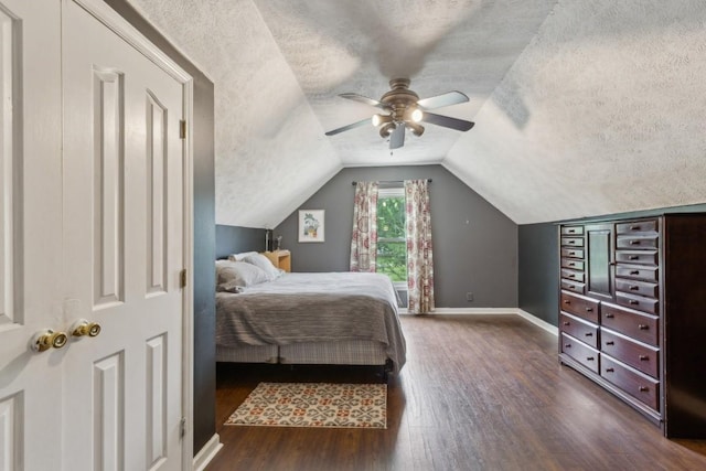3130 Valley Bend Rd, Murfreesboro, TN 37129 - bedroom with a textured ceiling, dark wood-type flooring, baseboards, vaulted ceiling, and ceiling fan