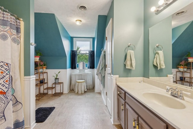3130 Valley Bend Rd, Murfreesboro, TN 37129 - full bath with vanity, wainscoting, and tile patterned floors
