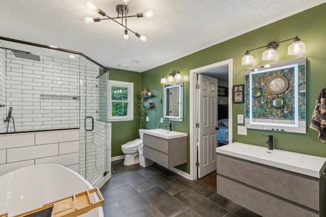 3130 Valley Bend Rd, Murfreesboro, TN 37129 - bathroom with a stall shower, a freestanding tub, a chandelier, two vanities, and a textured ceiling