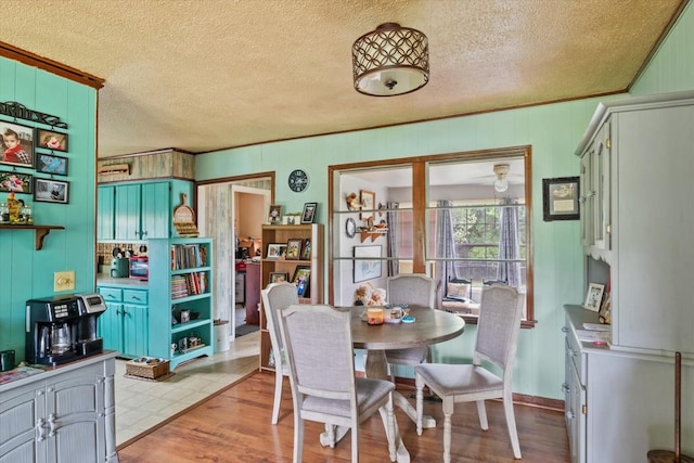 410 Sinking Creek Rd, Petersburg, TN 37144 - dining room featuring light wood-style flooring and a textured ceiling