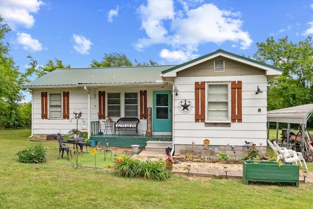 410 Sinking Creek Rd, Petersburg, TN 37144 - view of front facade featuring a front lawn, a porch, and metal roof