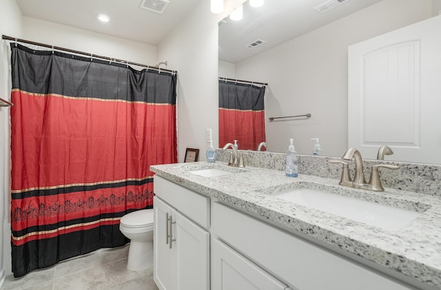 2023 Sperling Dr, Gallatin, TN 37066 - bathroom featuring toilet, double vanity, recessed lighting, a shower with shower curtain, and tile patterned floors