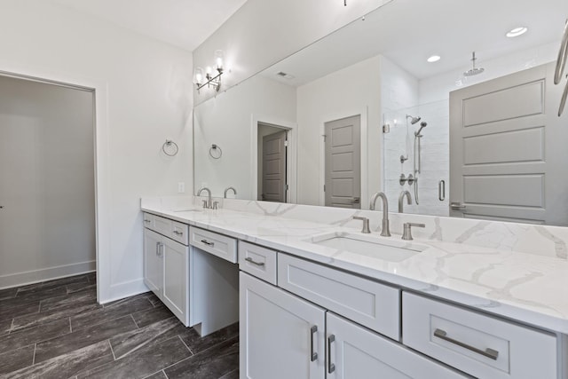 5509 Urbandale Ave, Nashville, TN 37209 - bathroom with double vanity, a stall shower, baseboards, and recessed lighting