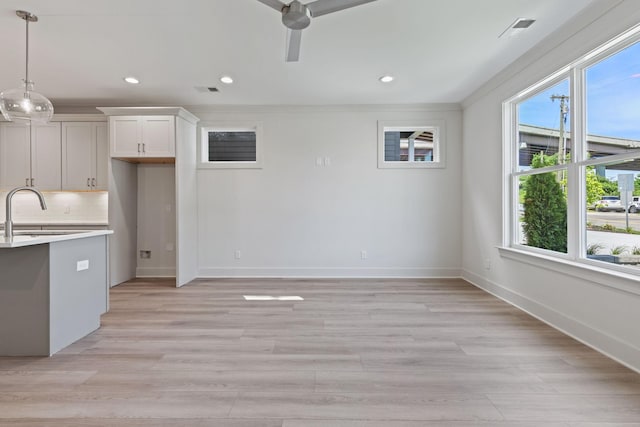 5509 Urbandale Ave, Nashville, TN 37209 - kitchen with a sink, ceiling fan, recessed lighting, light countertops, and decorative light fixtures