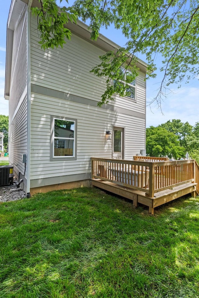5509 Urbandale Ave, Nashville, TN 37209 - back of house featuring a deck, central AC unit, and a yard