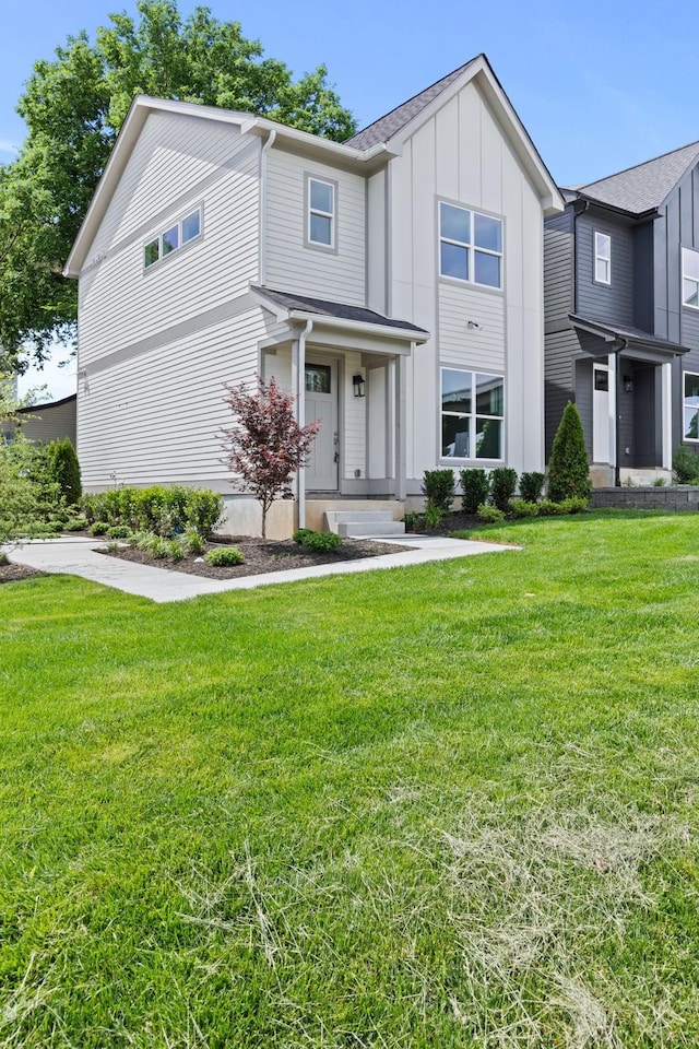 5509 Urbandale Ave, Nashville, TN 37209 - view of front of house featuring board and batten siding and a front lawn
