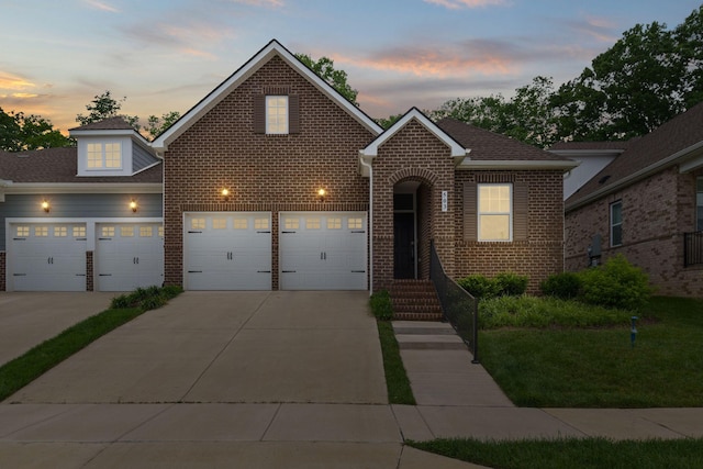 503 Gingerwood Ln, Hendersonville, TN 37075 - traditional-style house featuring driveway, brick siding, and a front yard