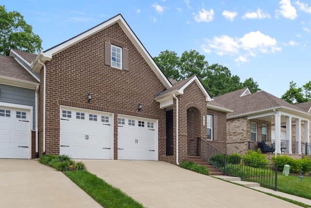 503 Gingerwood Ln, Hendersonville, TN 37075 - view of front of house with brick siding, concrete driveway, and roof with shingles